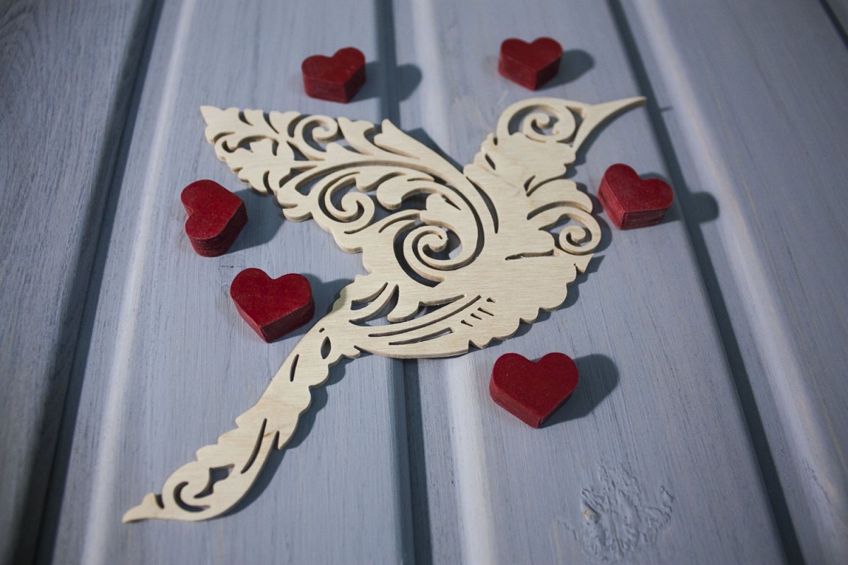 Резная птичка